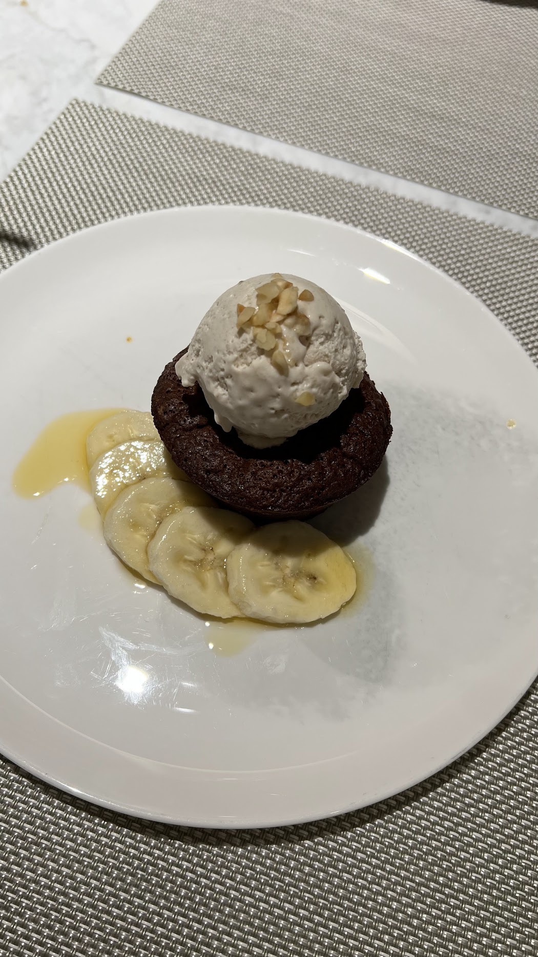 Chocolate and hazelnut cake with banana ice cream