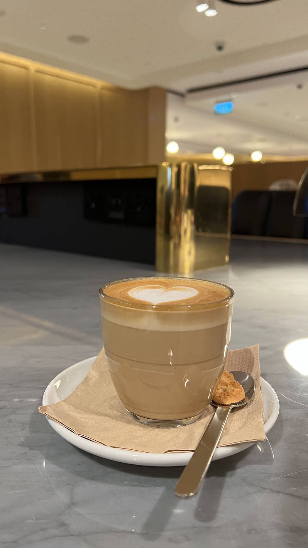 Qantas First Lounge Singapore barista coffee by the coworking tables
