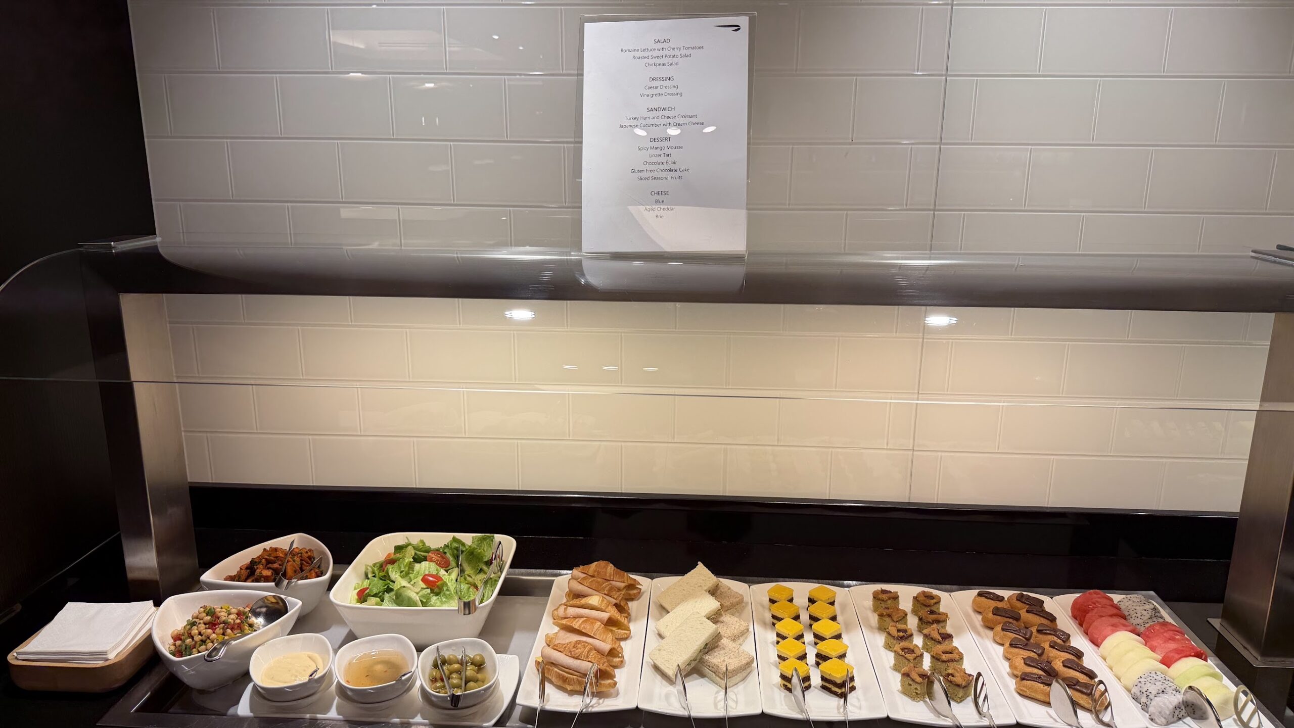 British Airways Lounge Singapore salad, sandwiches and pastries selection