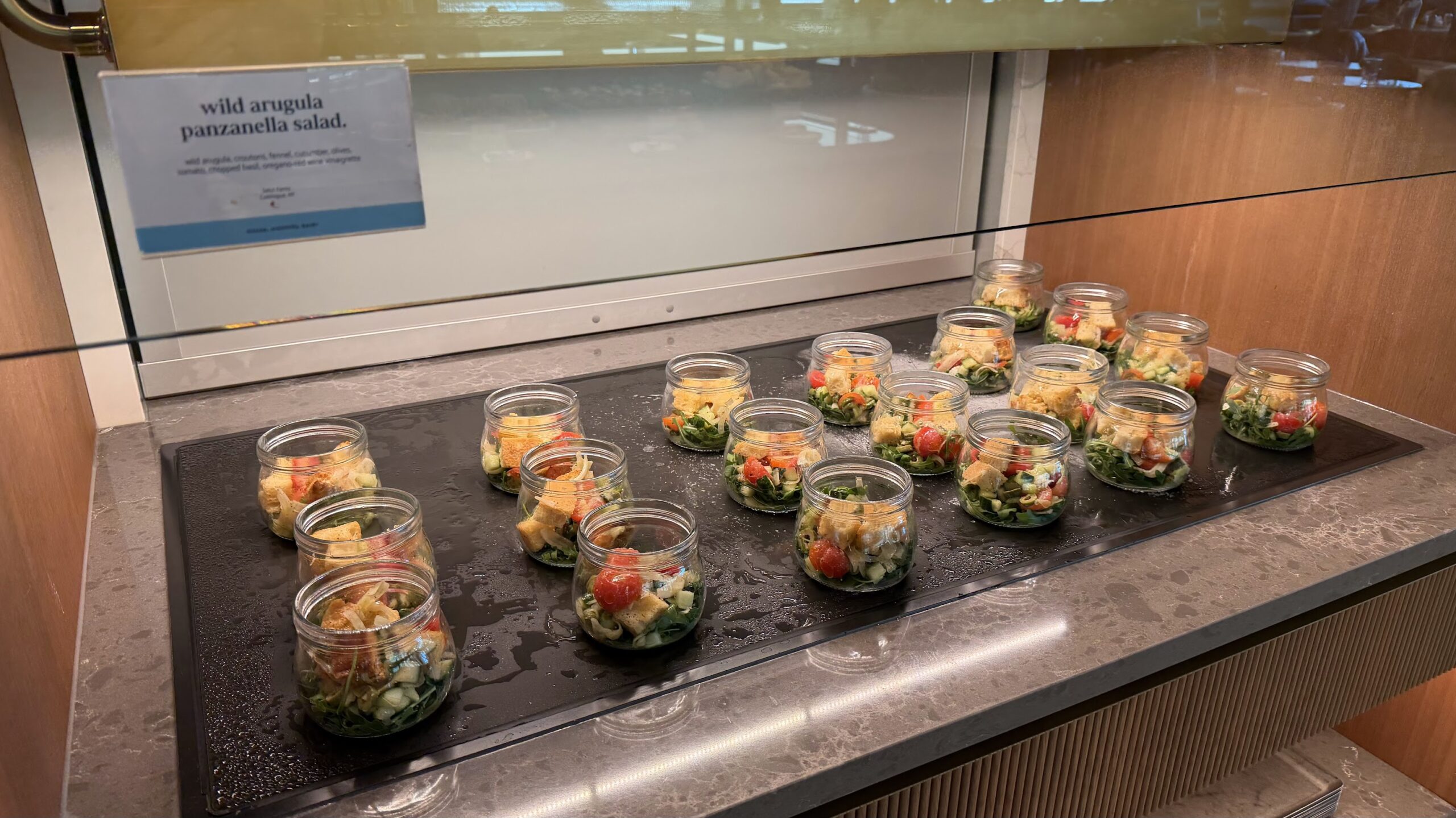 Small Plates Bar featuring wild arugula panzanella salad