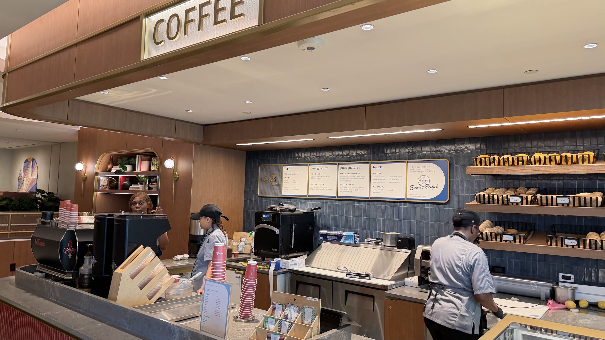 Capital One Lounge JFK's The Bodega offering coffee and bagels