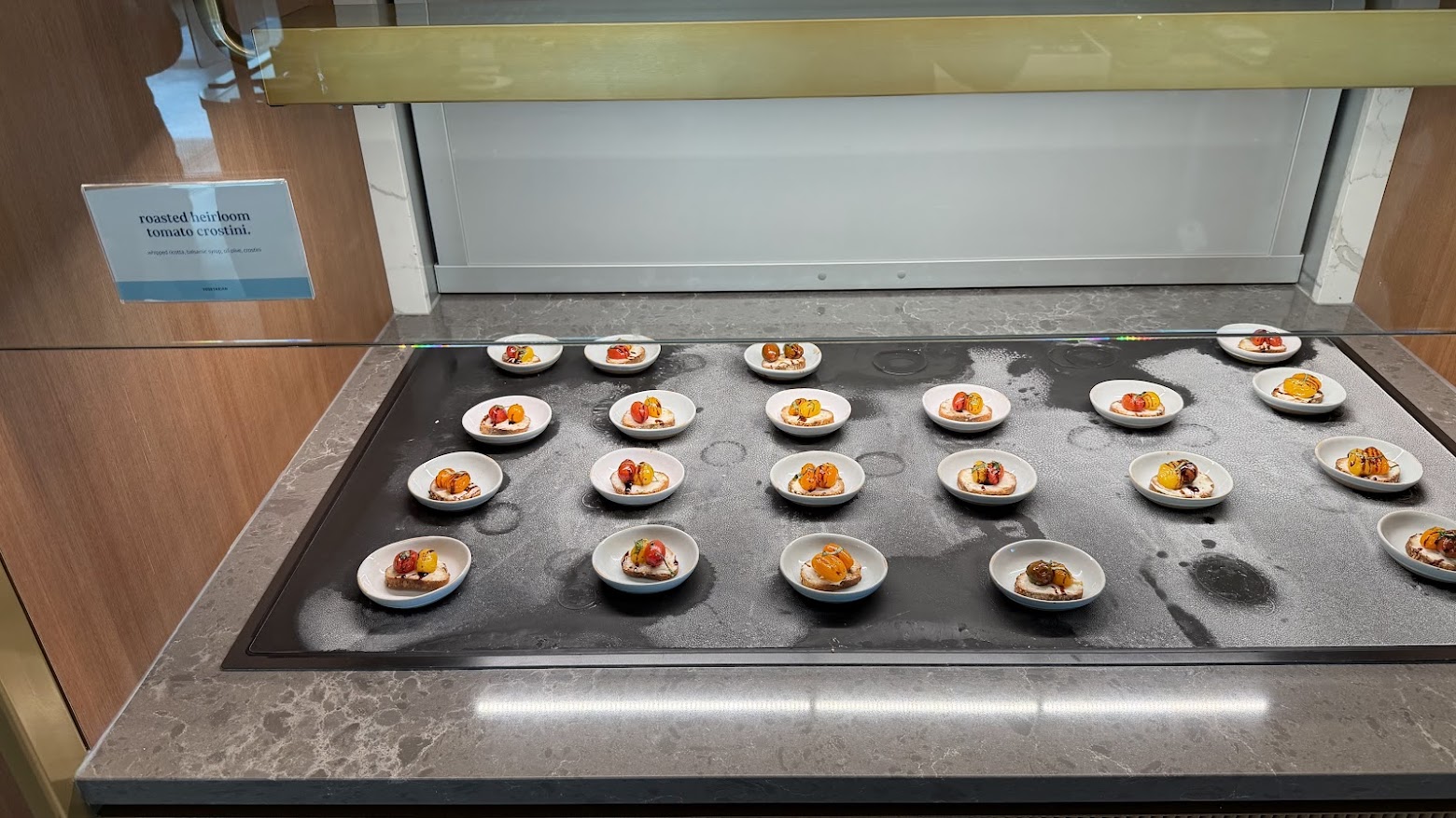 Small Plates Bar featuring roasted heirloom tomato crostini