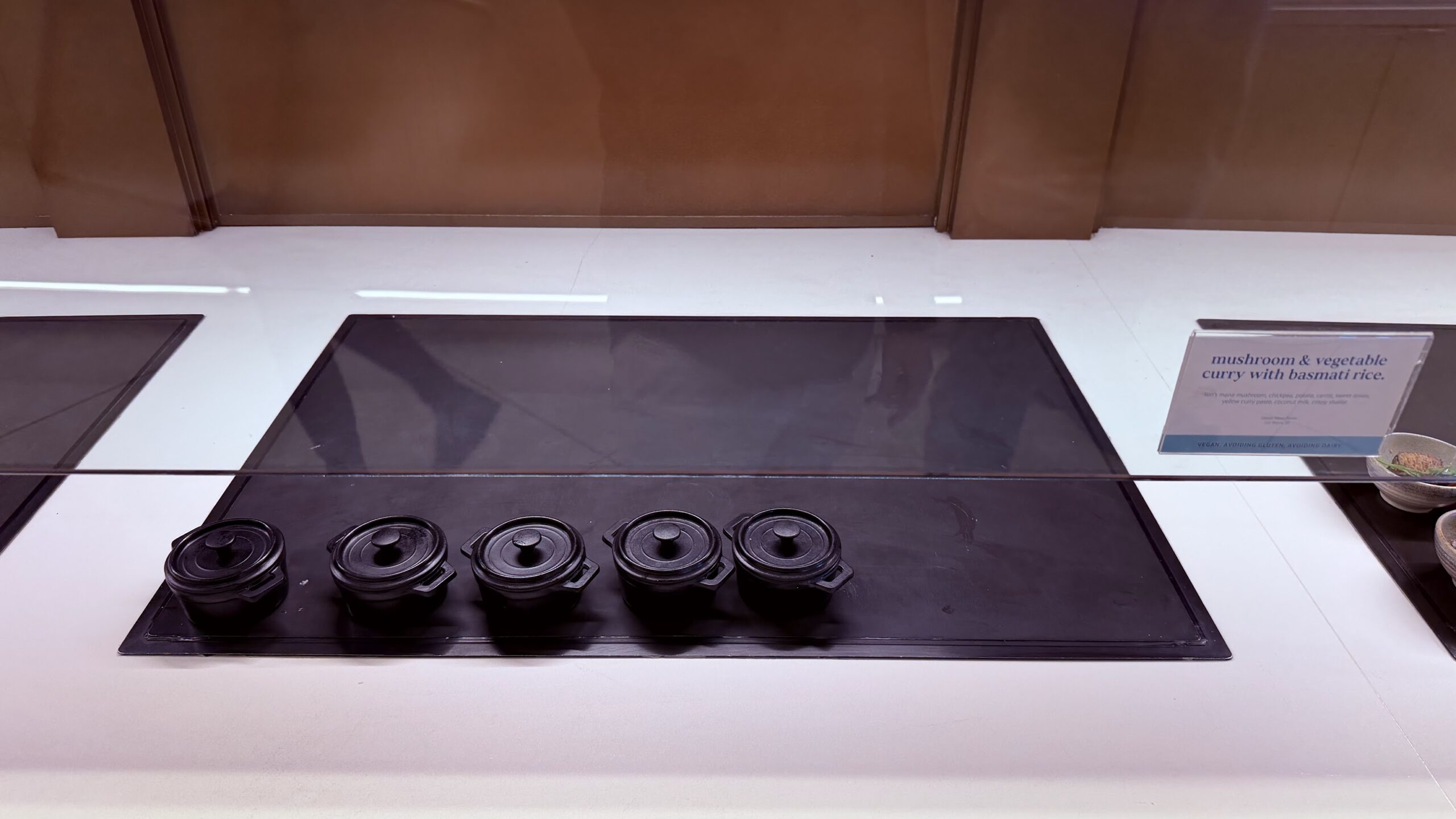 Capital One LAS vegetable curry with basmati rice and mushrooms