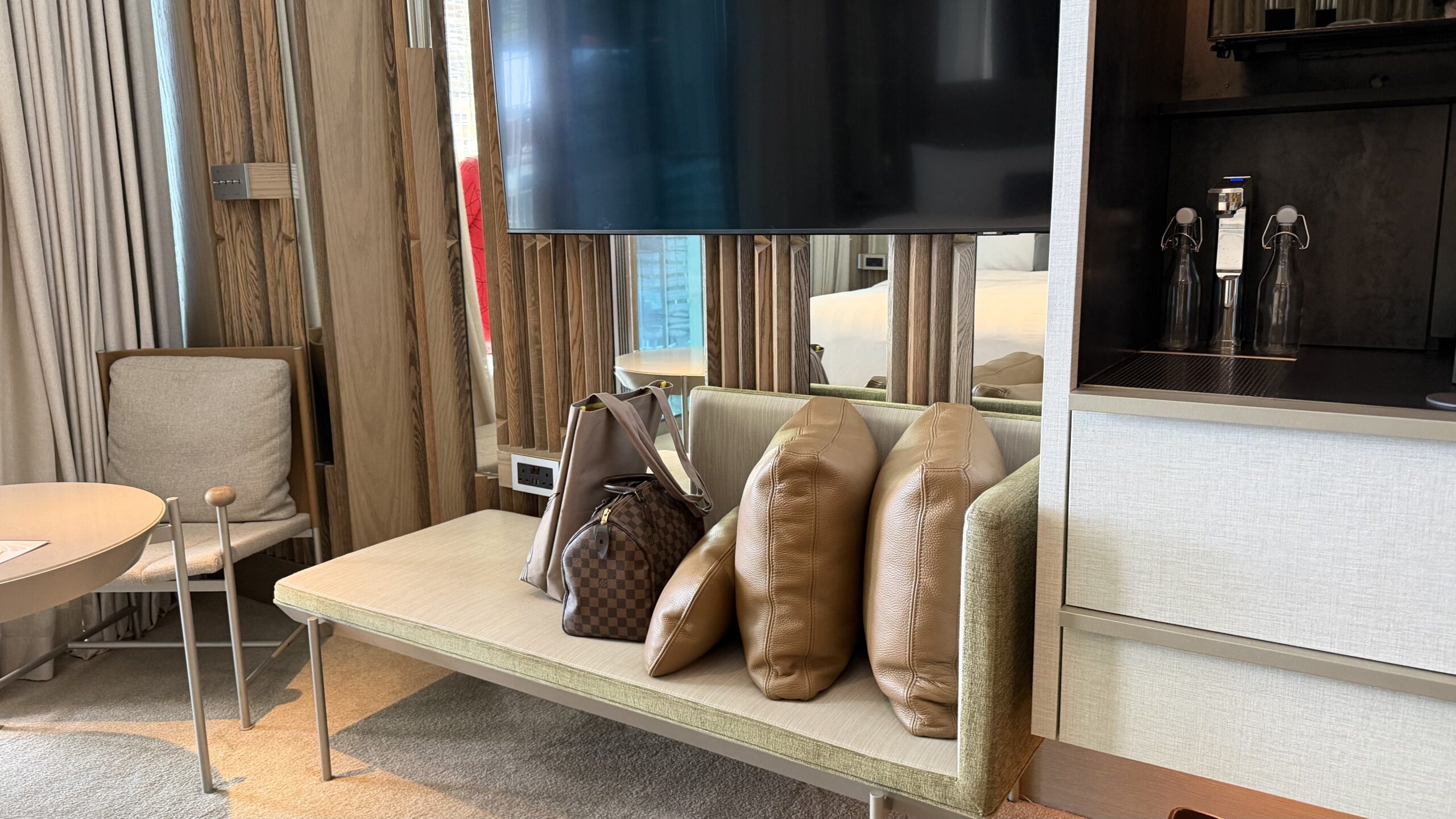 Sofa and TV of the Beach Terrace Balcony King room