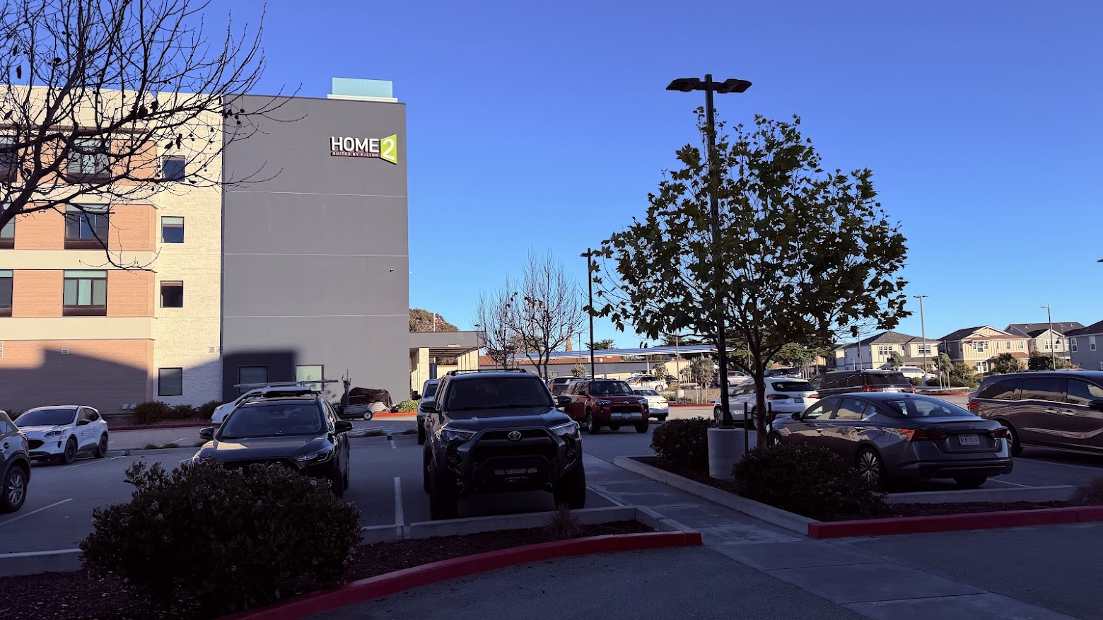 Exterior of the SpringHill Suites by Marriott The Dunes on Monterey Bay facing Home2 Suites by Hilton