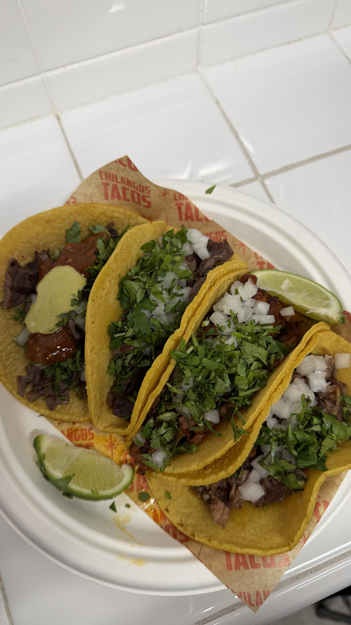 A mixed variety of tacos at Chilangos Tacos