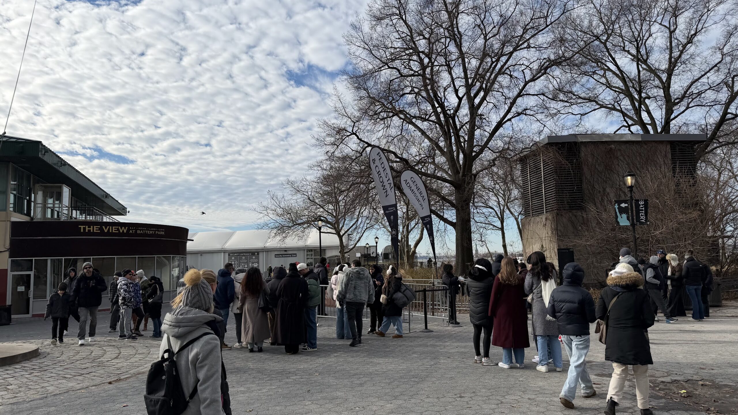 Queue to board the Statue City Cruises