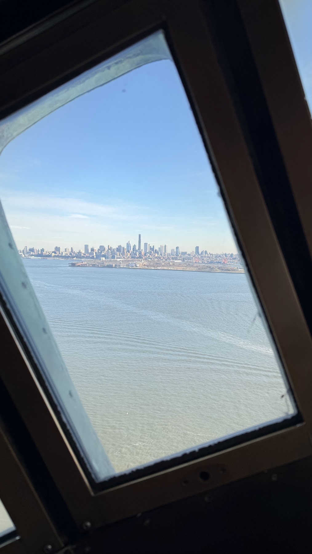 Views of New York City from the crown of the Statue of Liberty