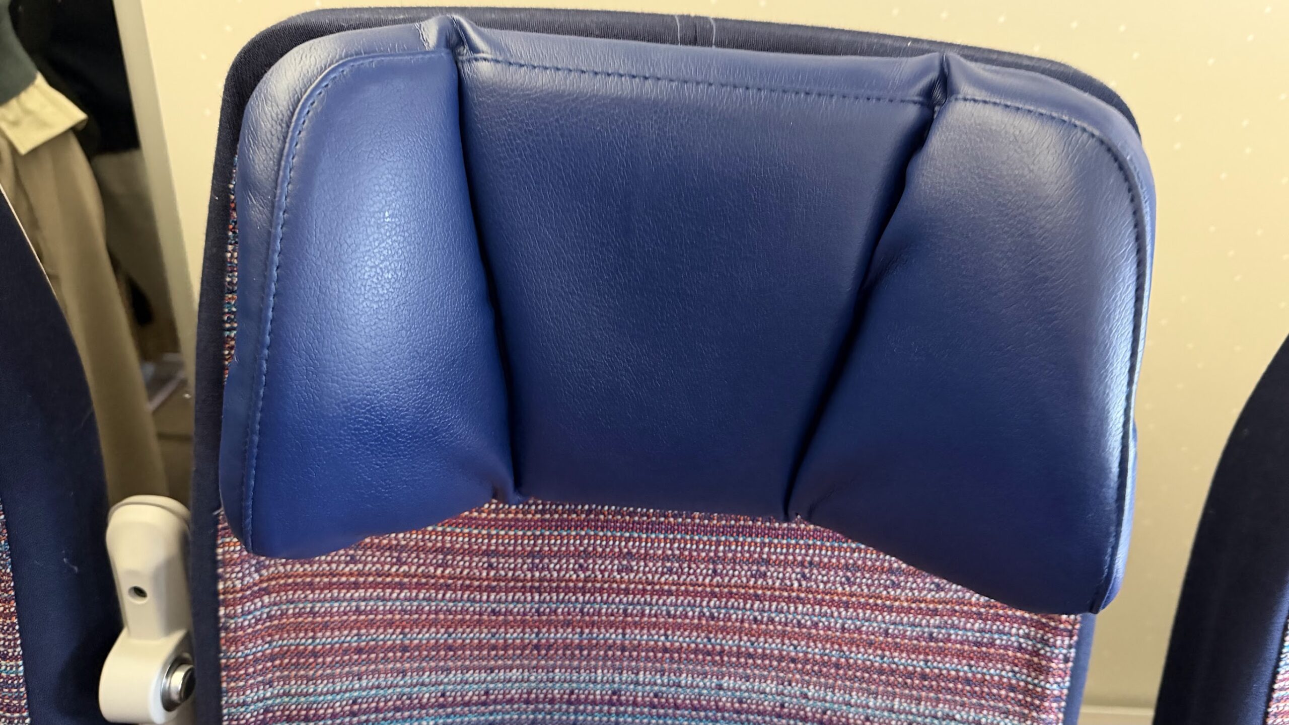 Asiana Airlines OZ752 economy class seat headrest