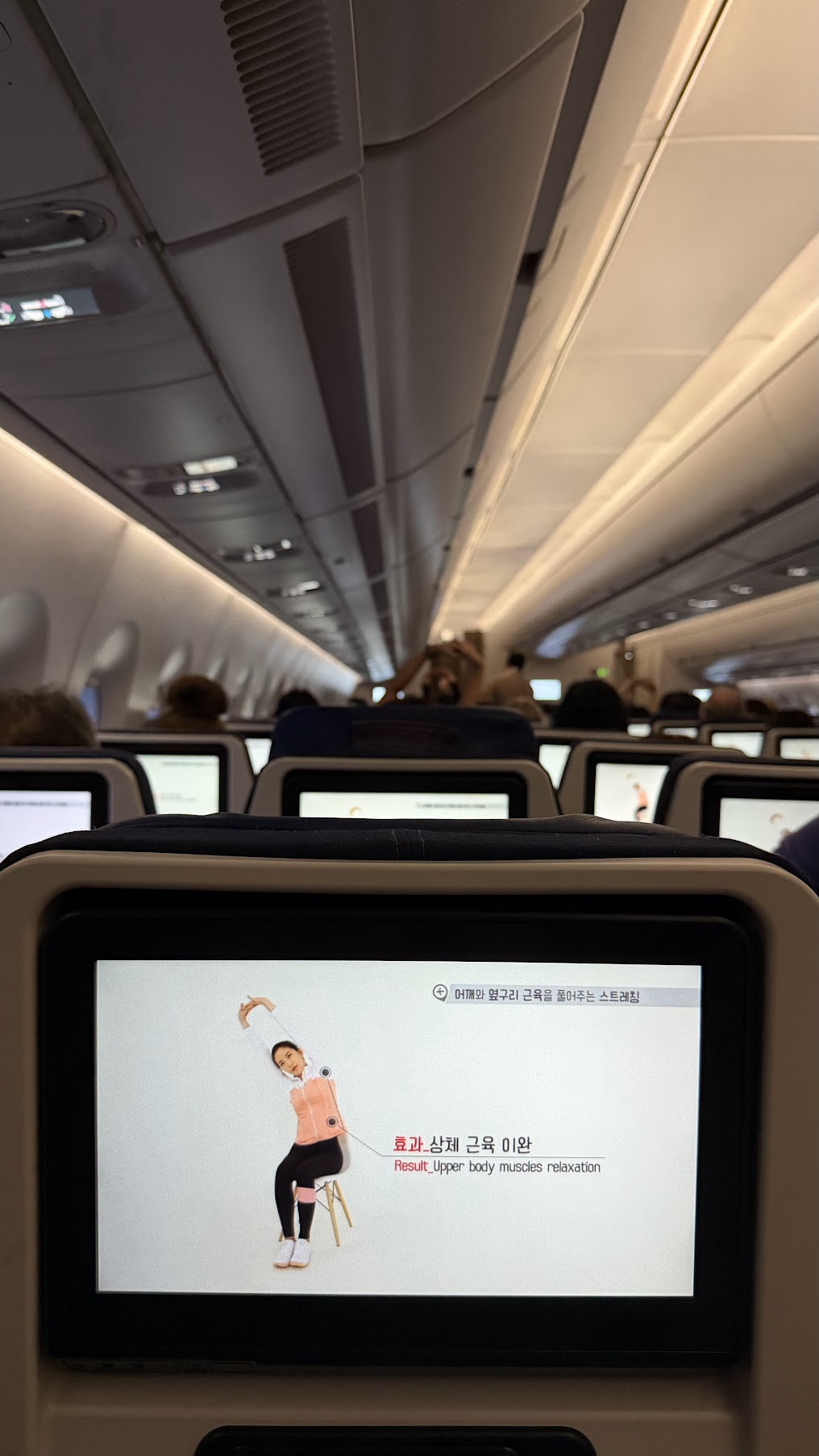 Asiana Airlines guided in-flight stretching exercises