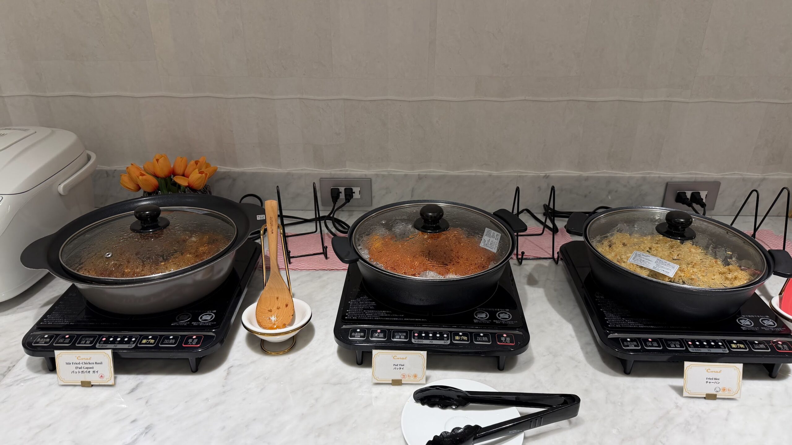 The Coral Finest Business Class Lounge Nagoya hot food selection