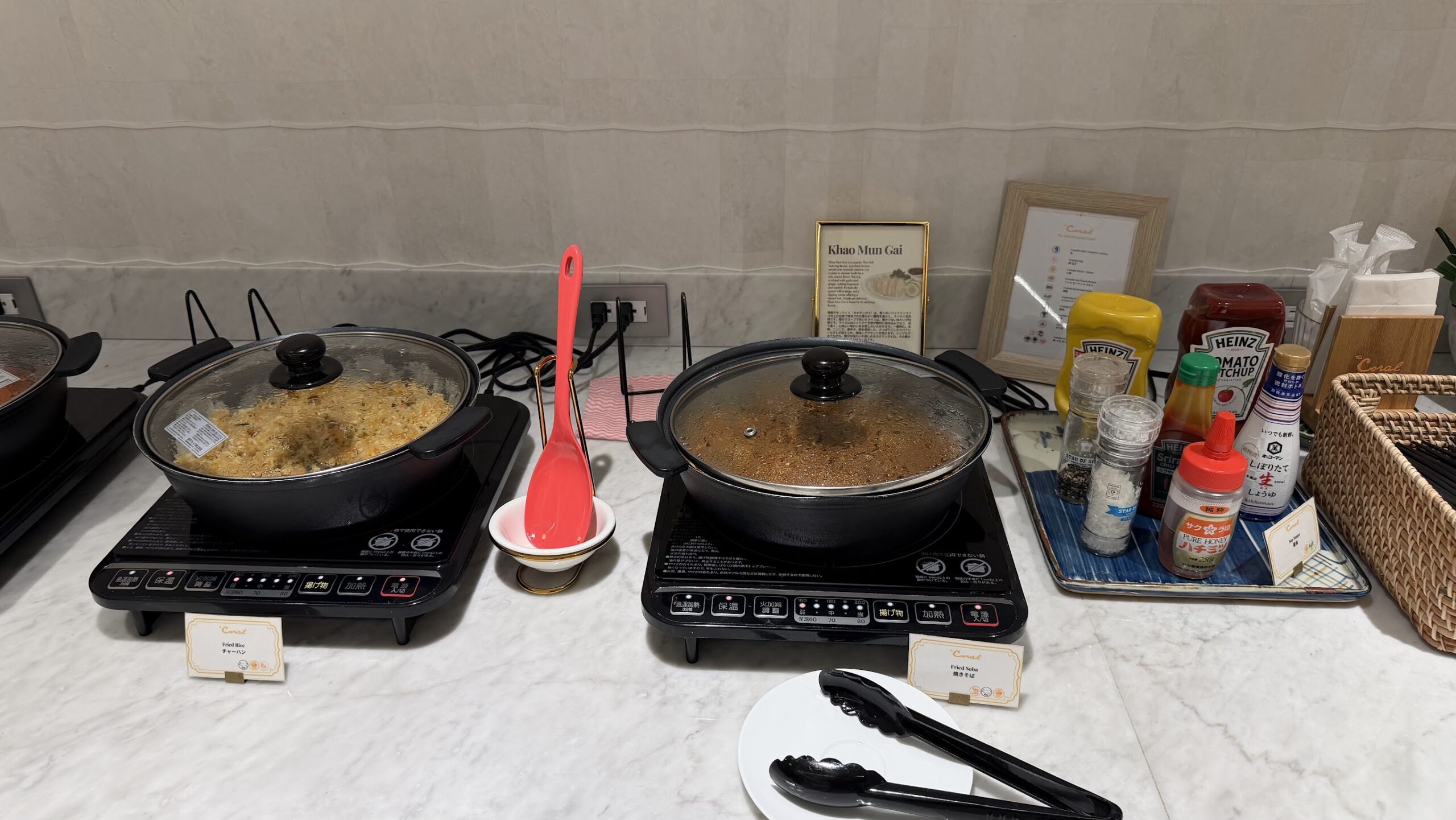 The Coral Finest Business Class Lounge Nagoya hot food selection
