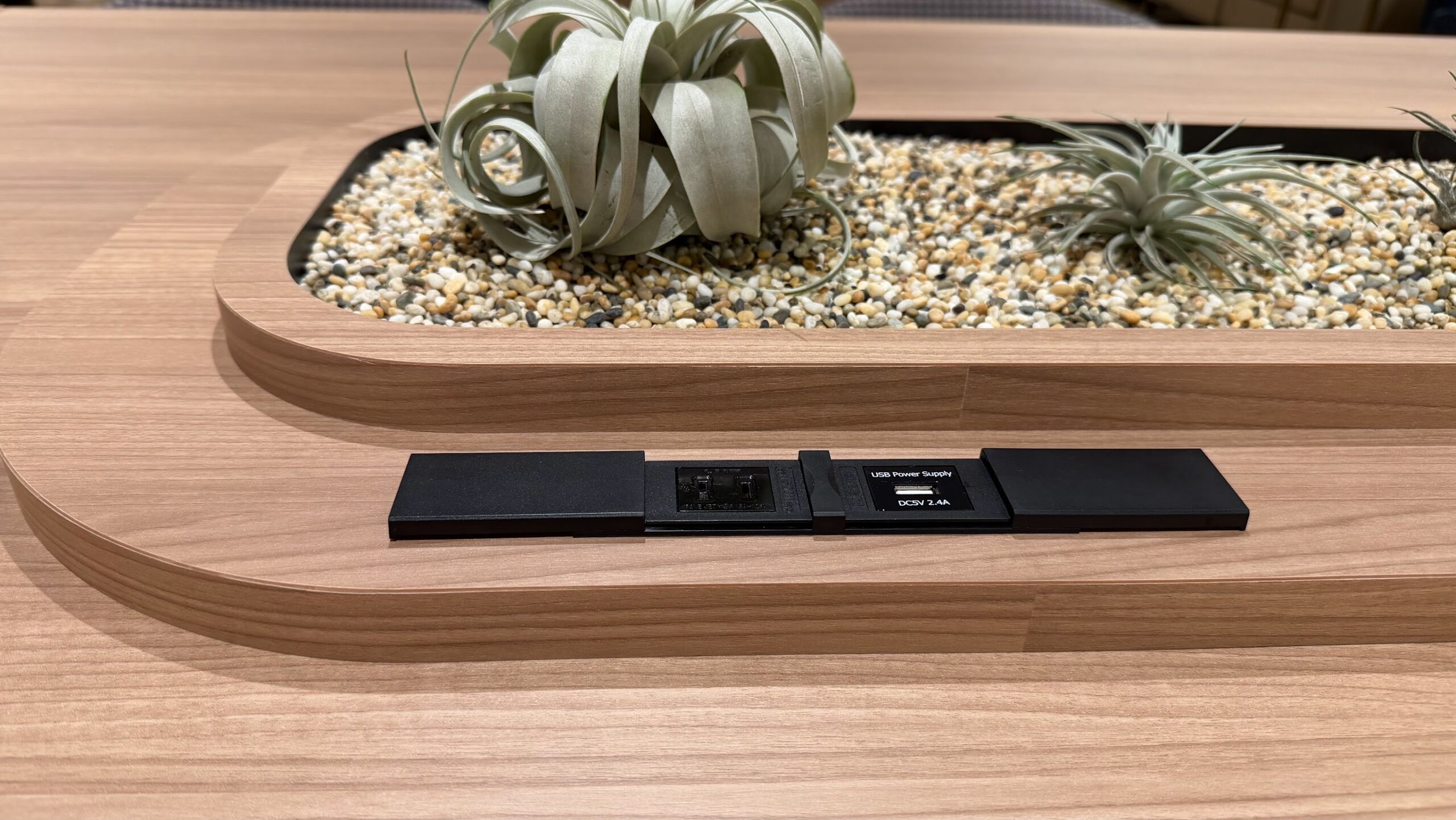 The Coral Finest Business Class Lounge Nagoya seating area with power sockets