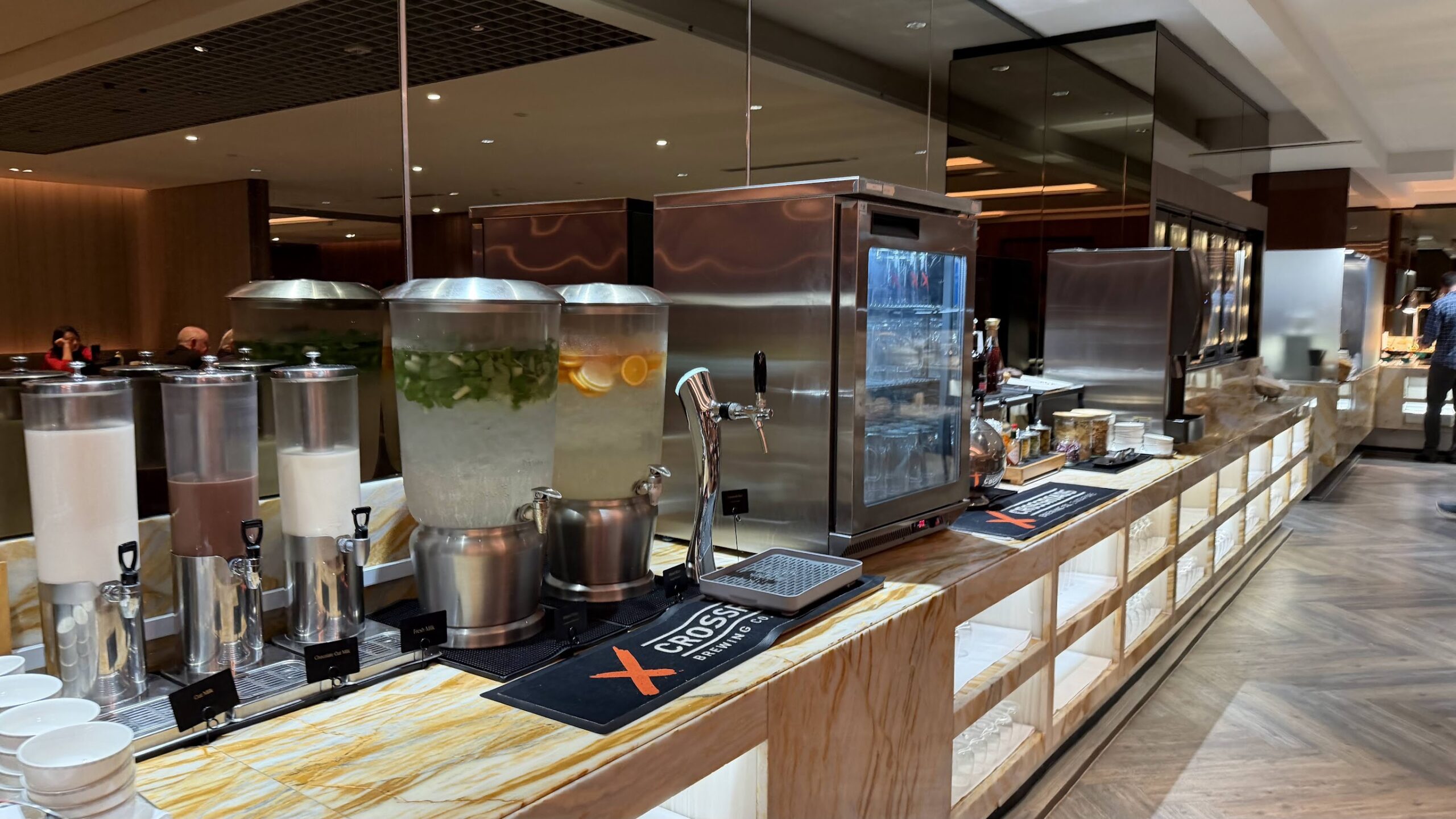 Singapore Airlines SilverKris Business Class Lounge T2 drinks selection of oat milk, infused water