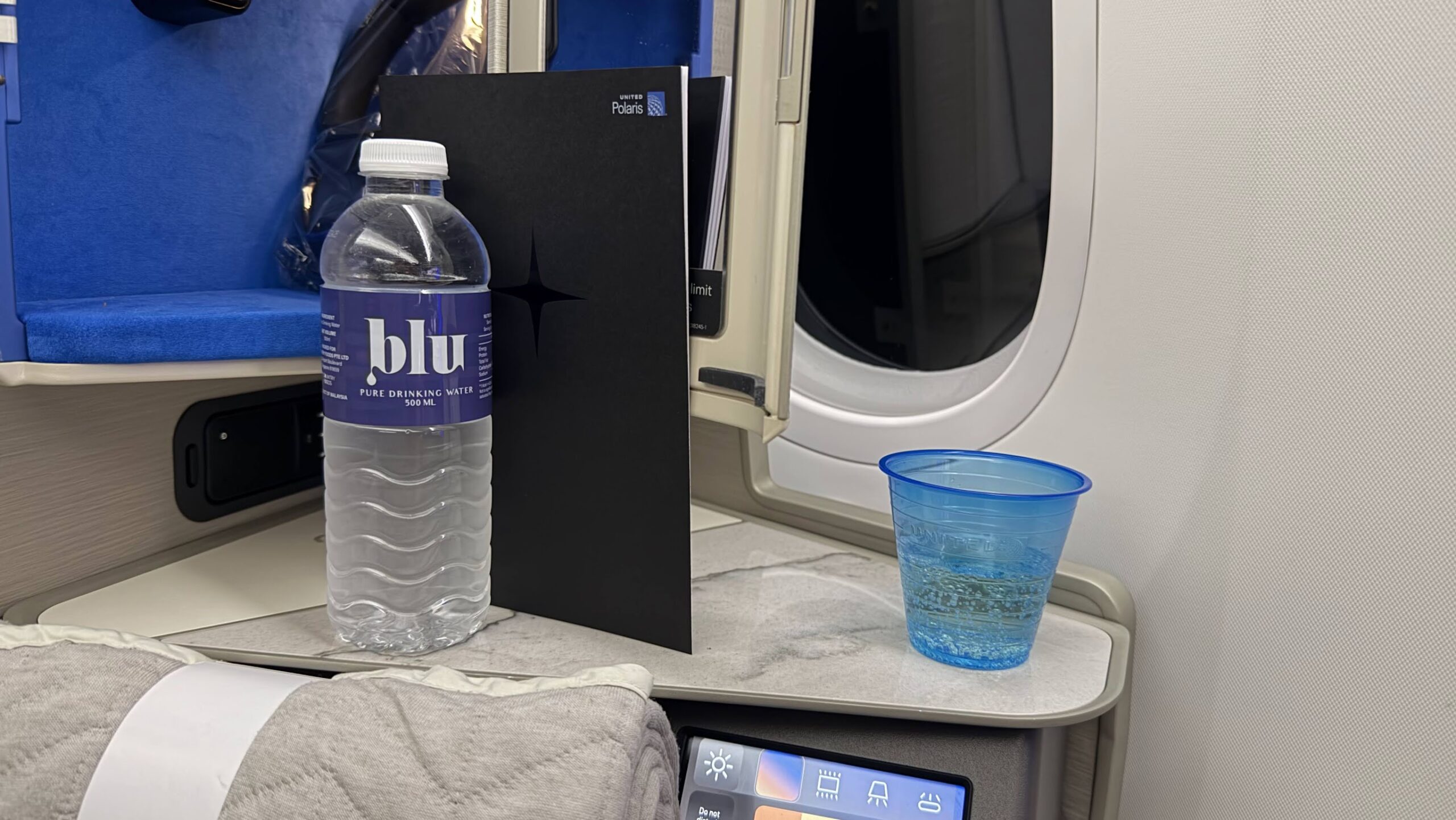 United Airlines UA2 Polaris business class pre-departure drink