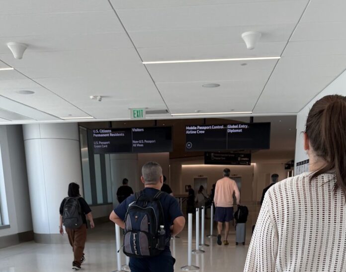 Signs for Aircrew and Global Entry lanes at SFO