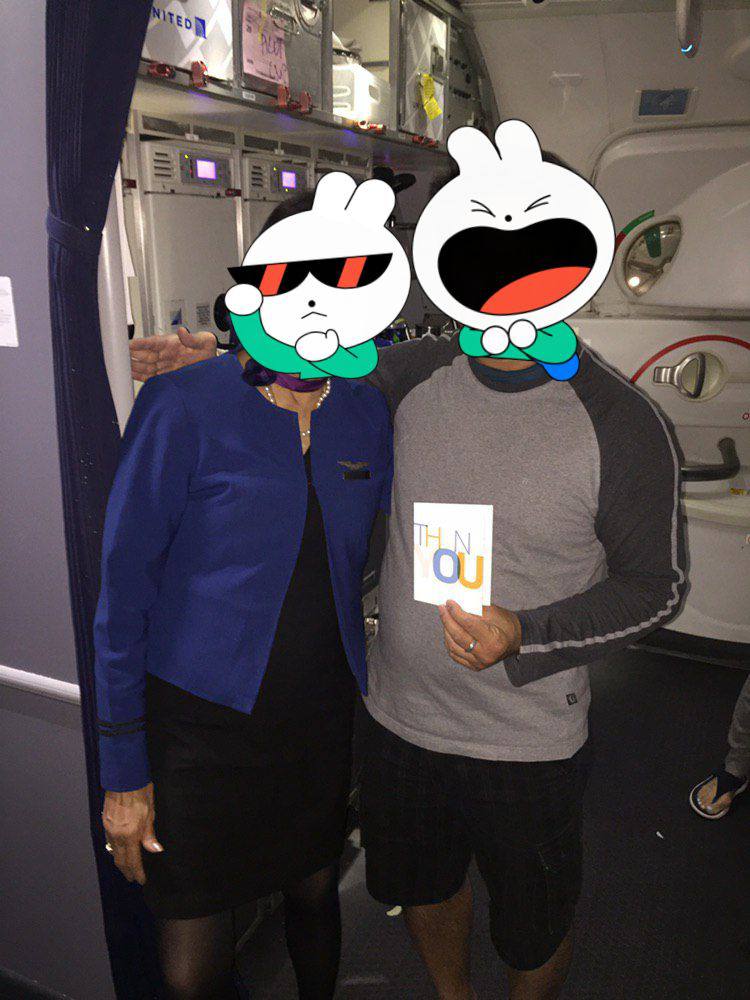 Photo with the chief purser onboard United Airlines UA29