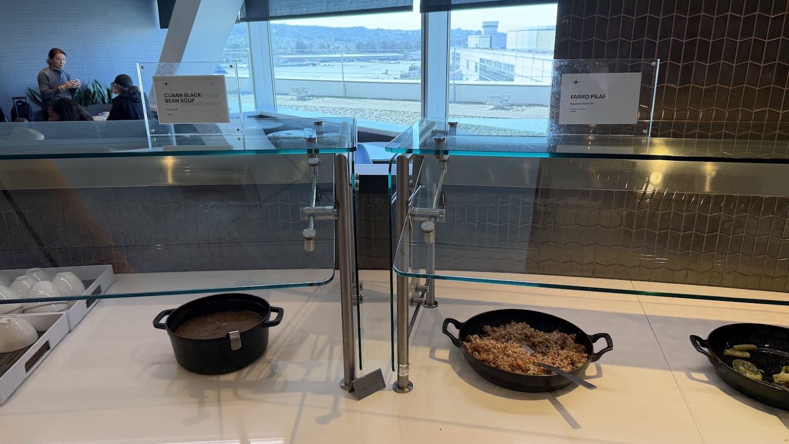 United Polaris Lounge San Francisco buffet with Cuban black bean soup and farro pilaf