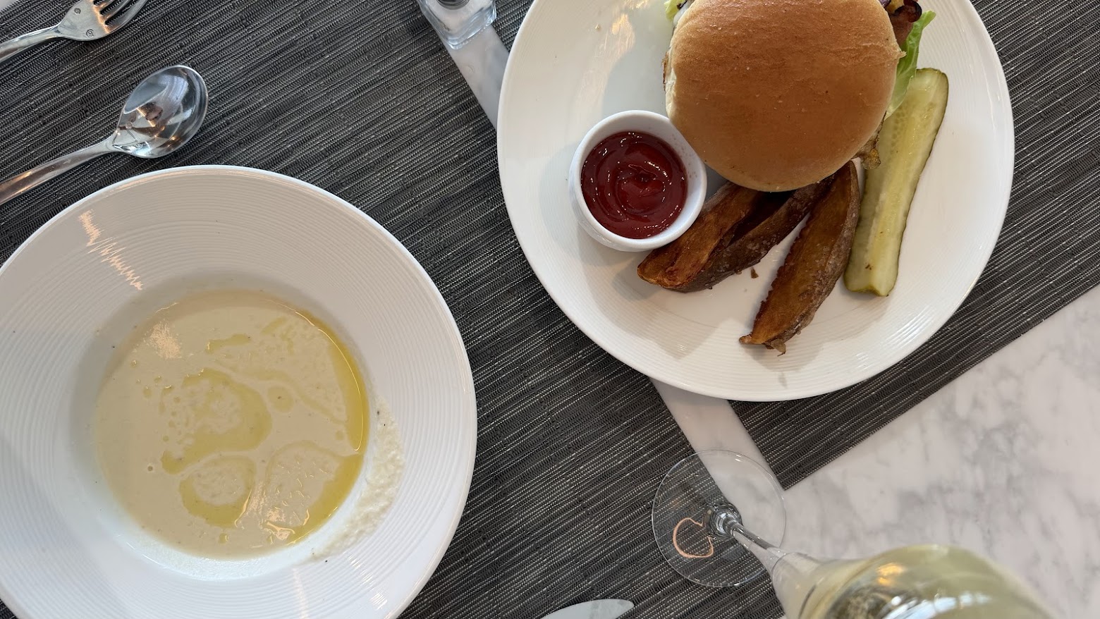 United Polaris Lounge San Francisco The Dining Room's signature Polaris burger and roasted cauliflower soup