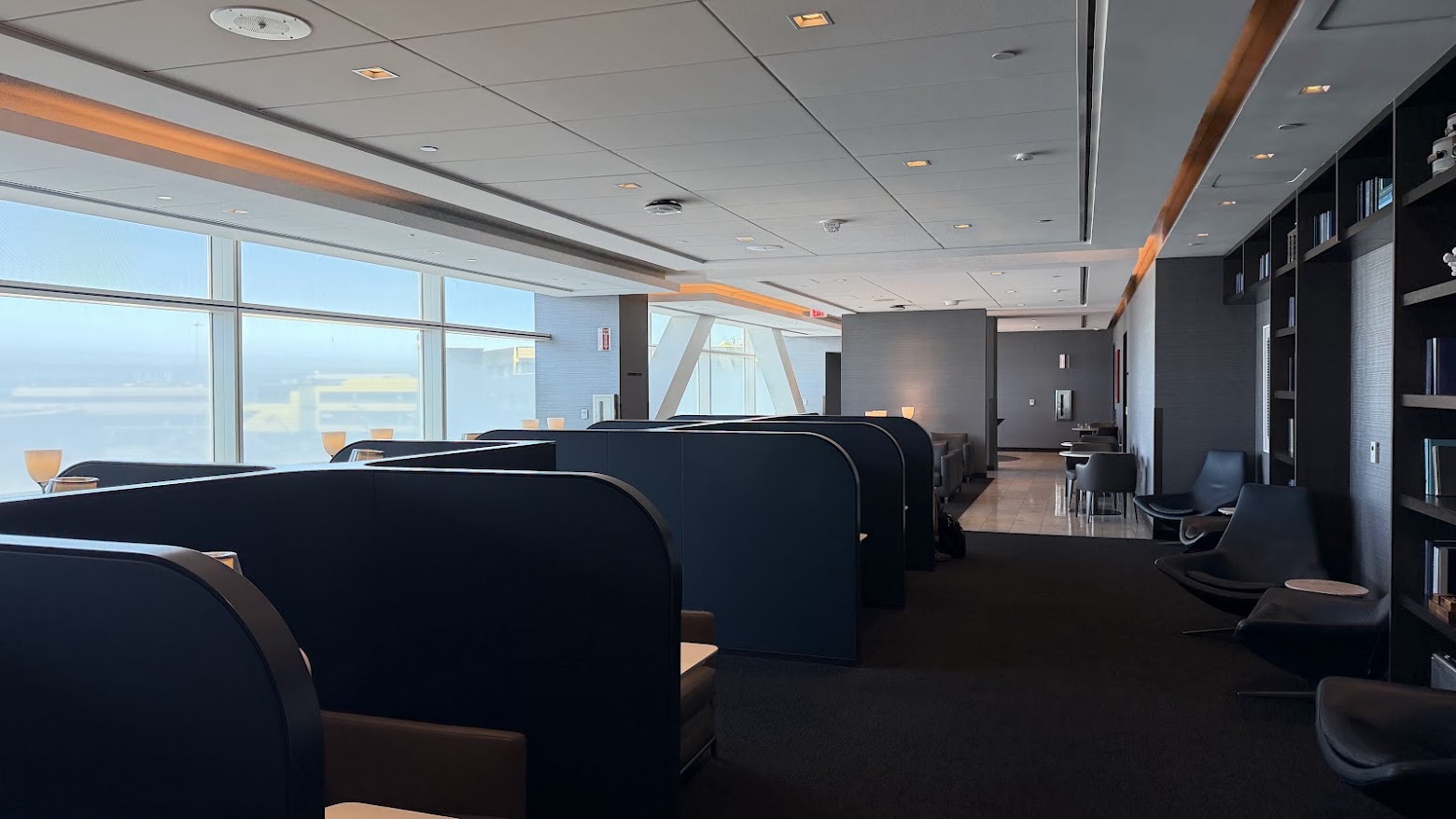 United Polaris Lounge San Francisco lower floor pods facing the tarmac windows