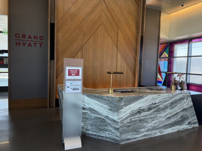 Grand Hyatt SFO with signs to the Waymo pickup point