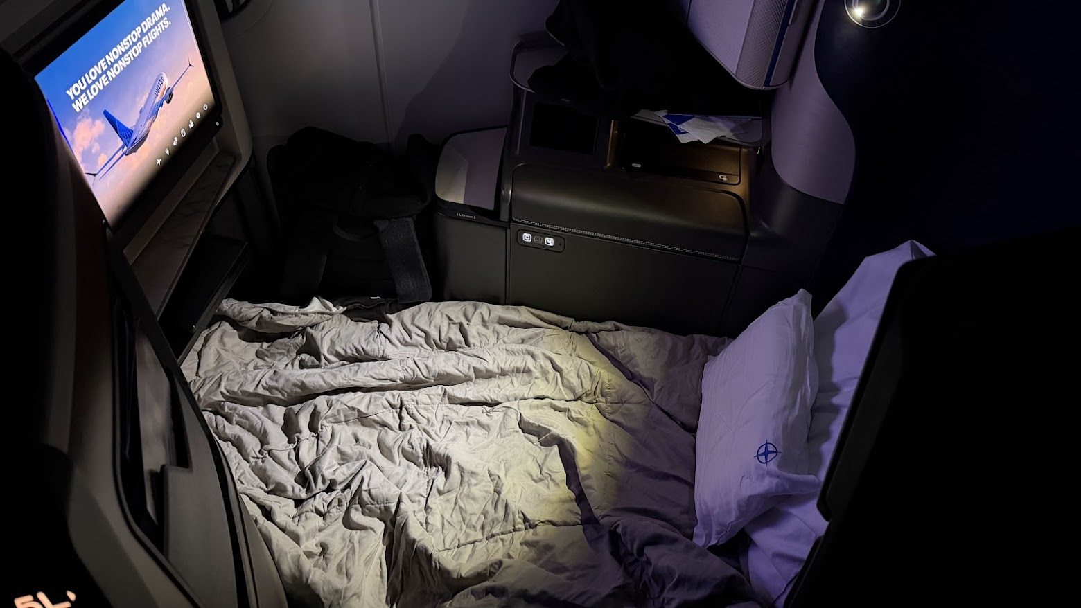 United Airlines UA1 Polaris business class seat turned into a bed