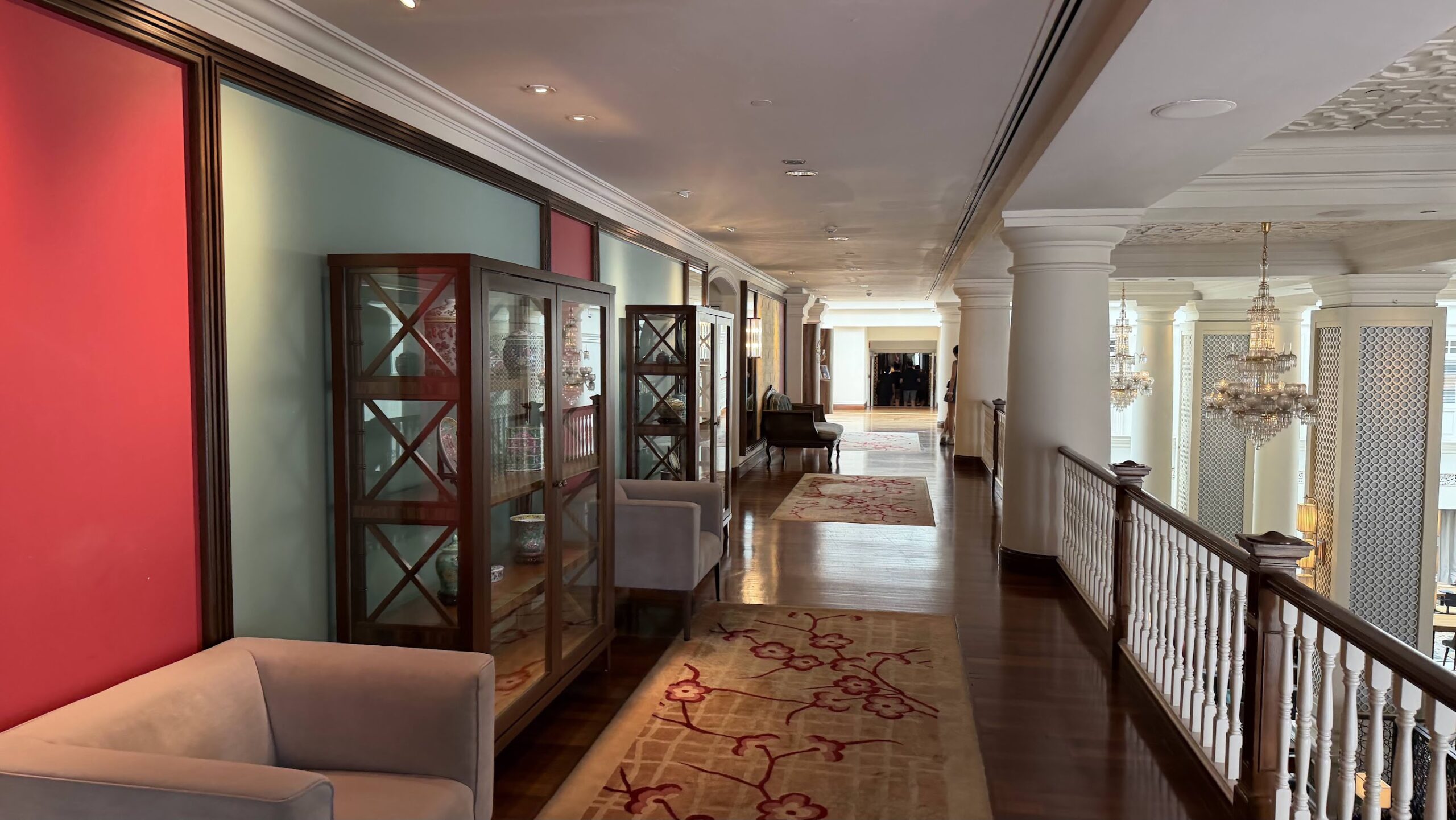 Frasers House corridor with display cabinets and lounge seating