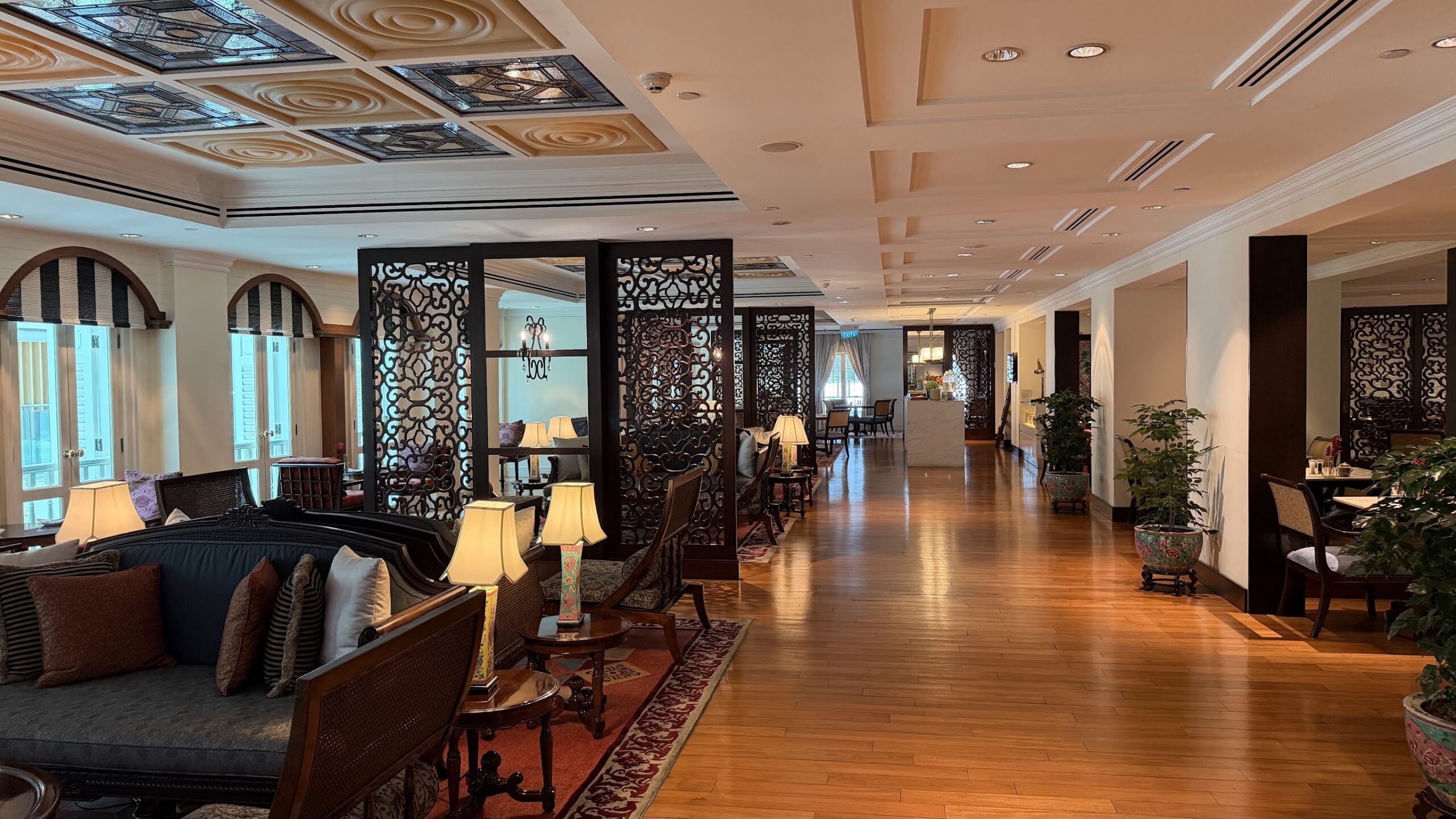 Frasers House lounge with carved screens and seating