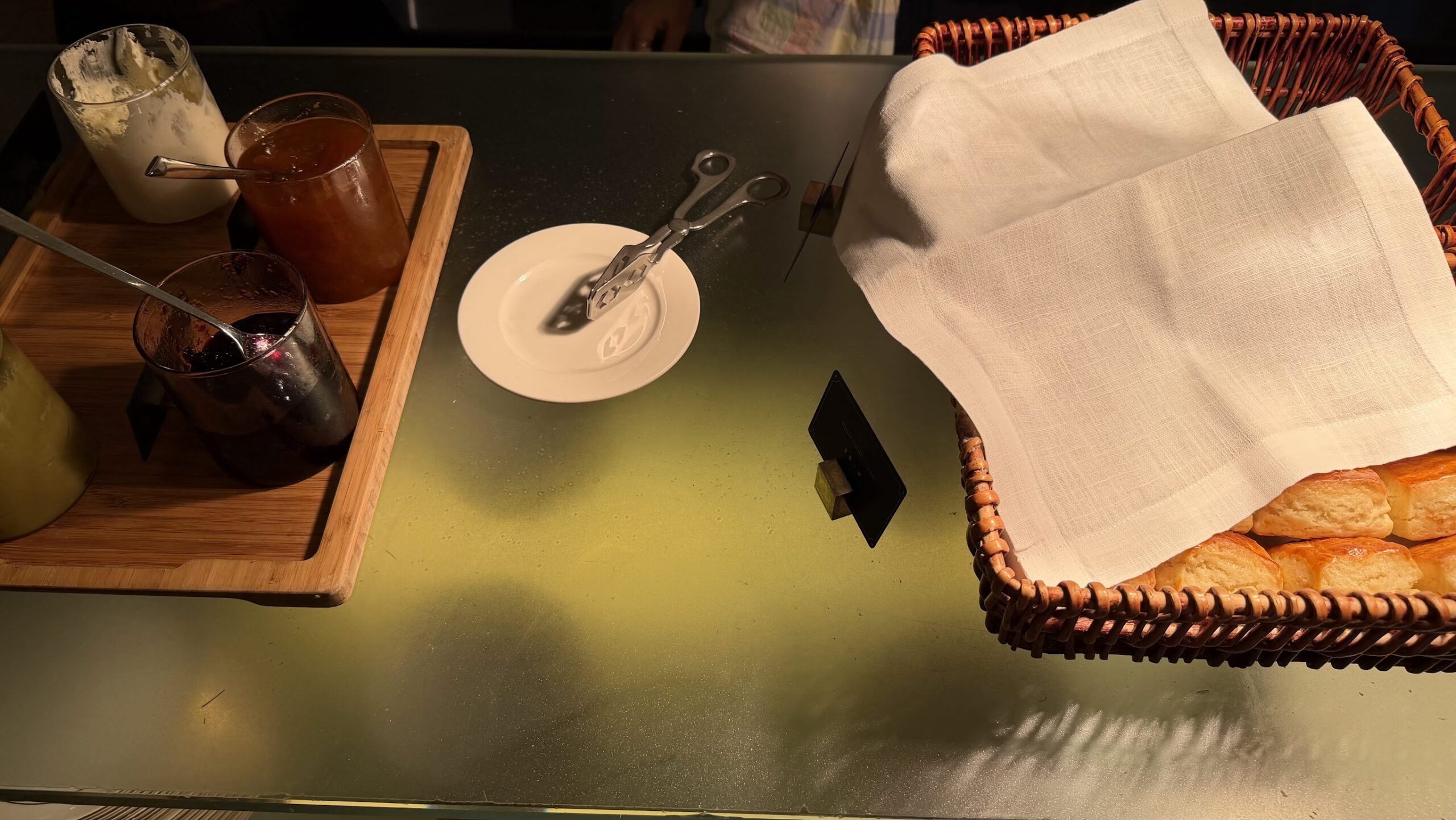 Frasers House Executive Lounge afternoon tea table with bread rolls