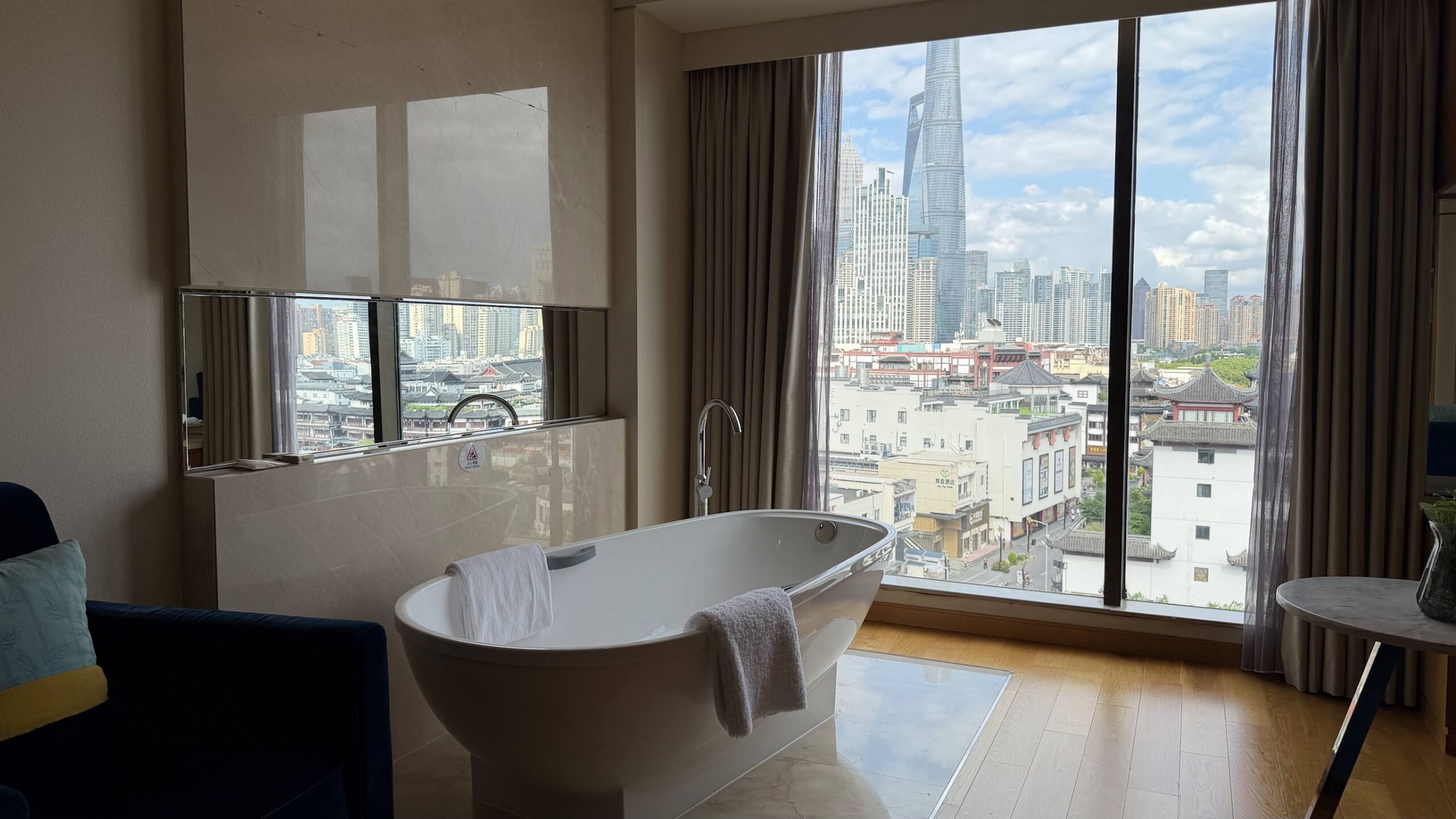 Renaissance Shanghai Yu Garden Hotel Bund River View Studio freestanding bathtub overlooking the Old City and Pudong skyline
