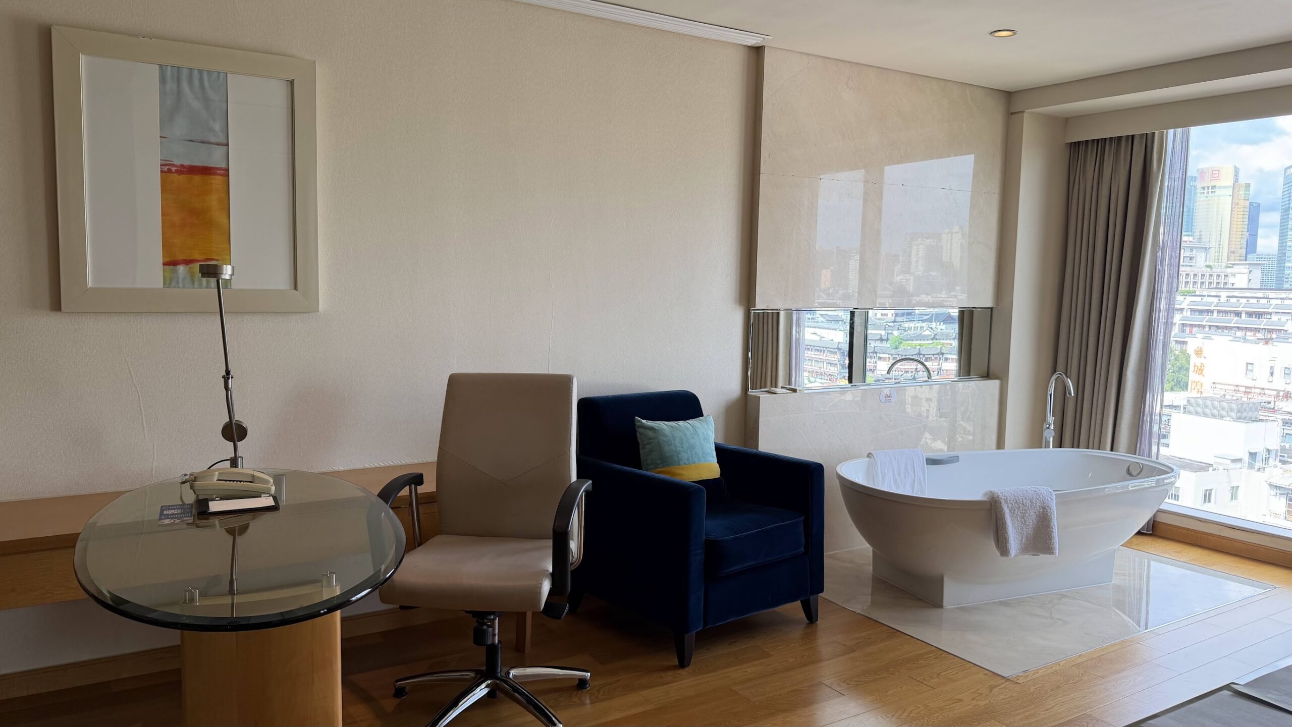 Renaissance Shanghai Yu Garden Hotel Bund River View Studio work desk and armchair beside the bathtub