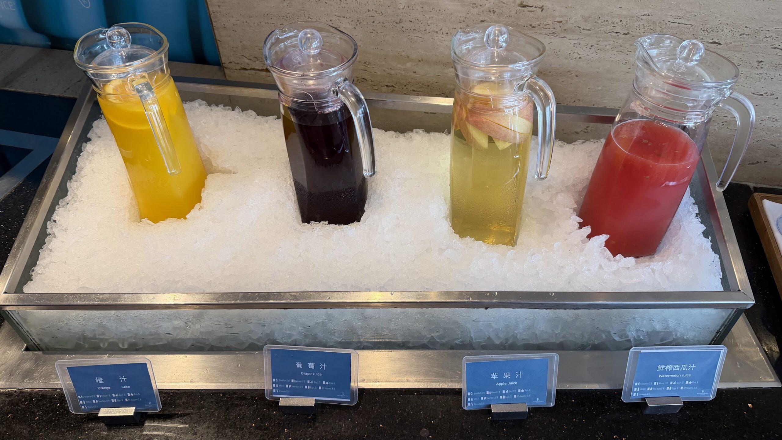 Renaissance Shanghai Yu Garden Hotel Executive Lounge orange, grape, apple and watermelon juices