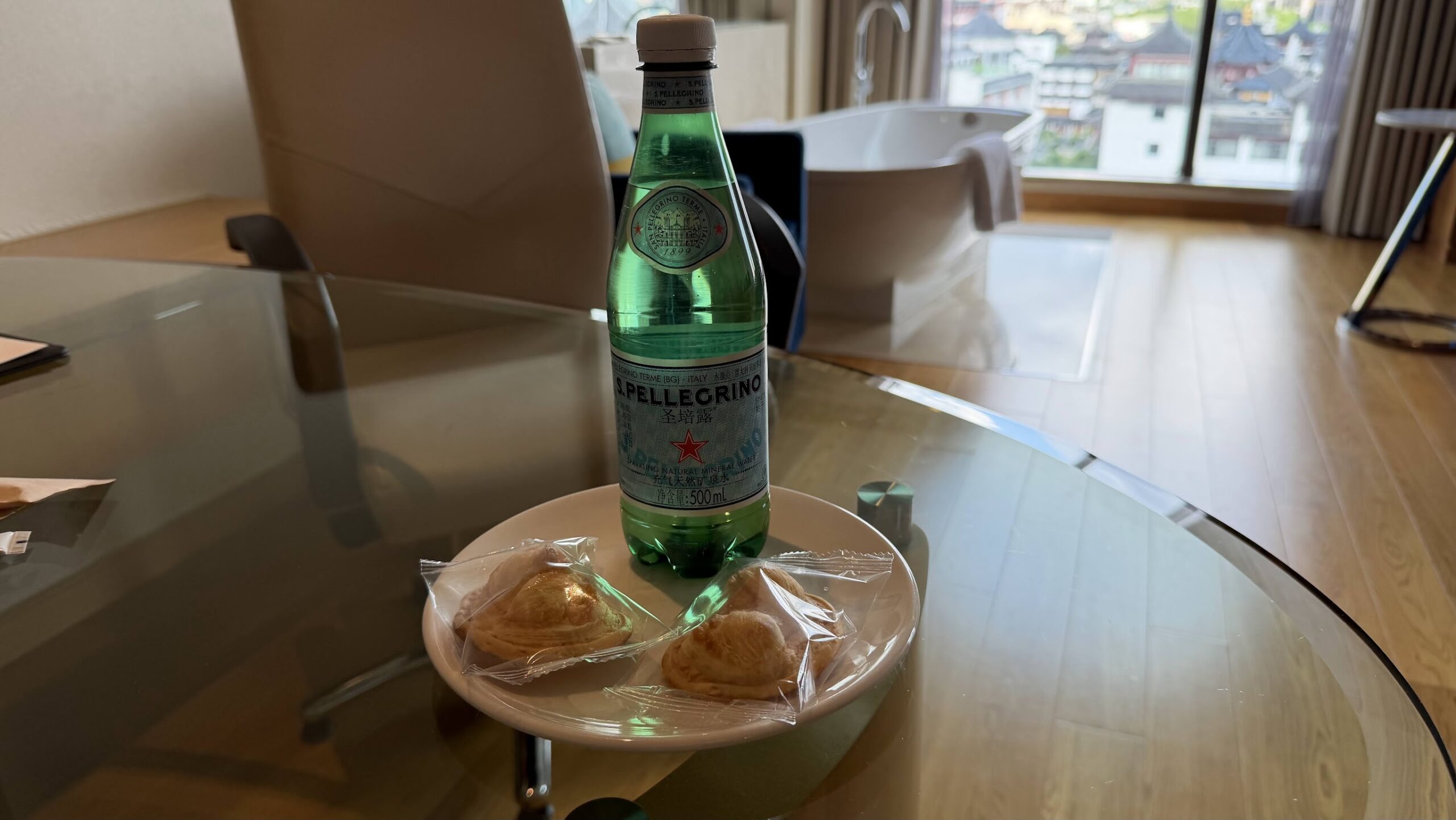 Renaissance Shanghai Yu Garden Hotel welcome amenity with packaged pastries and S.Pellegrino sparkling water