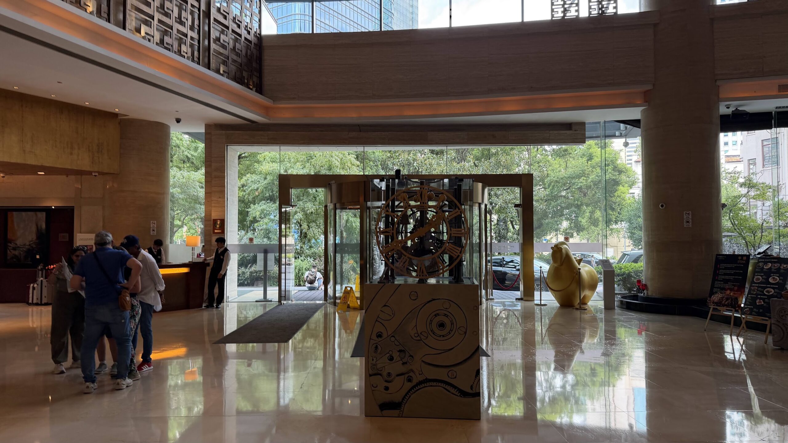 Swissôtel Grand Shanghai lobby entrance and large clock