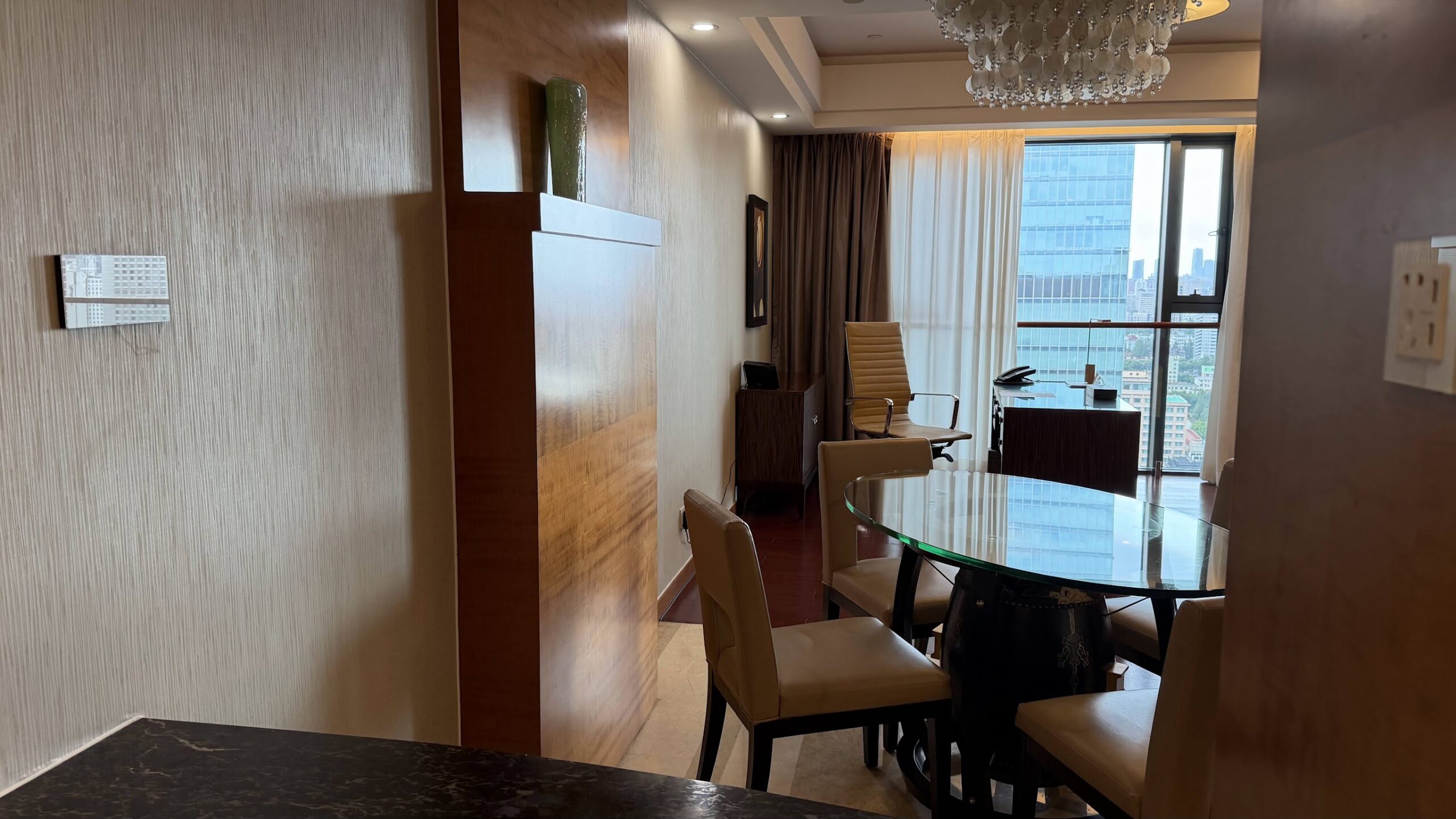 Swissôtel Grand Shanghai Executive Suite dining table and work area