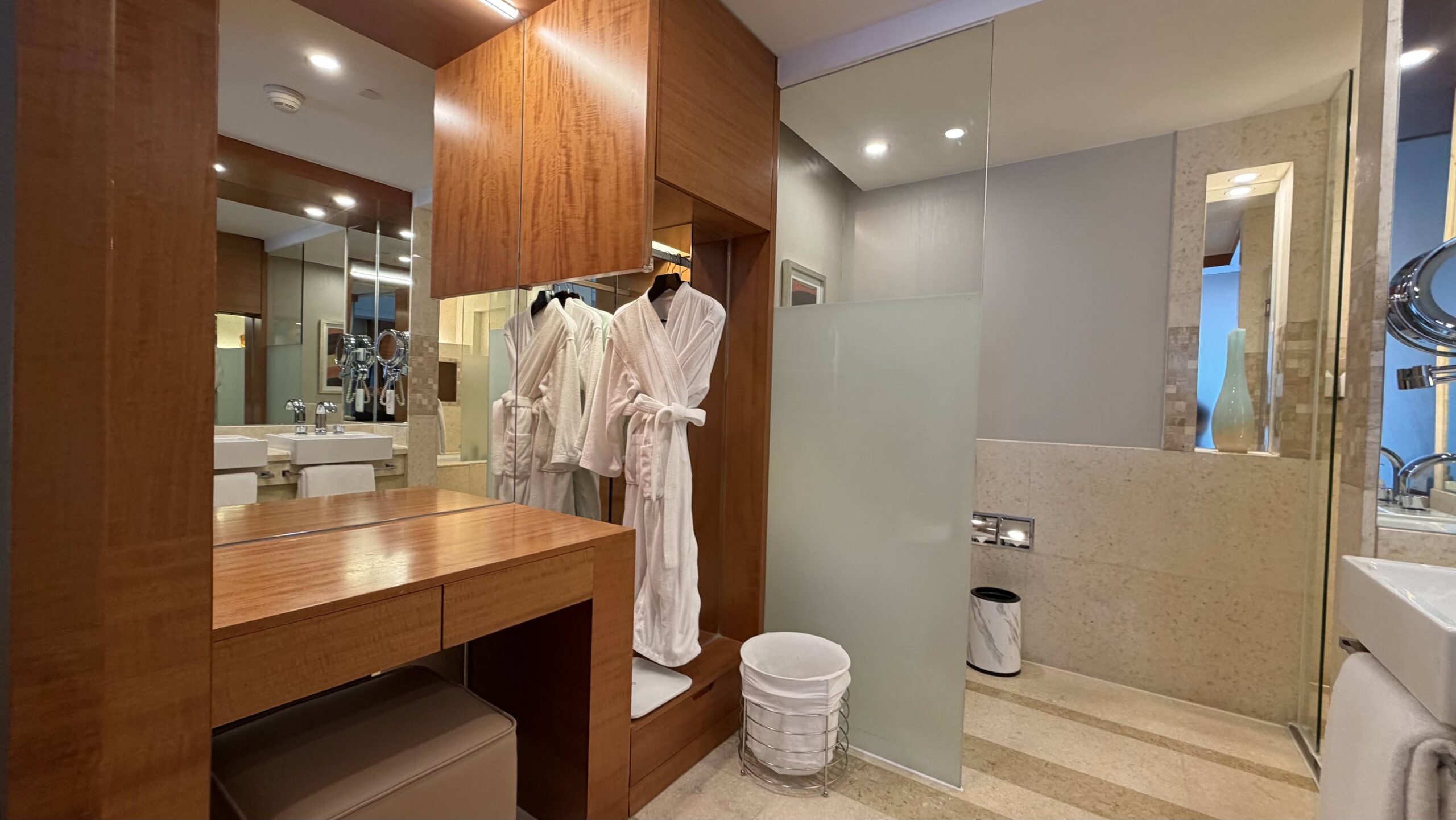 Swissôtel Grand Shanghai Executive Suite bathroom dressing table and bathrobes