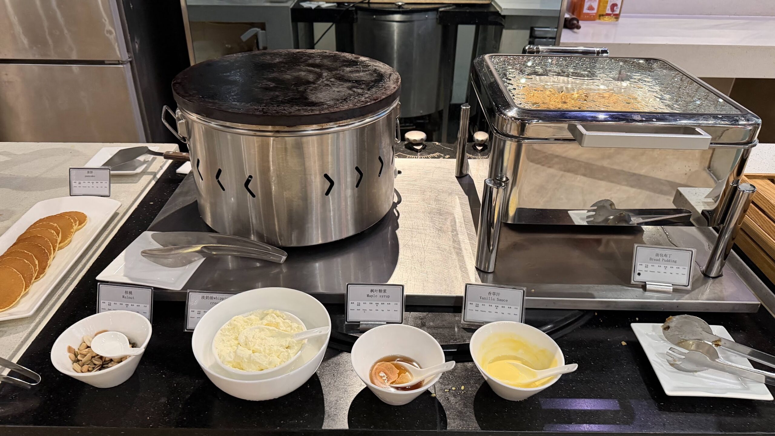 Swissôtel Grand Shanghai Café Swiss pancakes, toppings and bread pudding