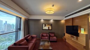 Swissôtel Grand Shanghai Executive Suite living room and city view