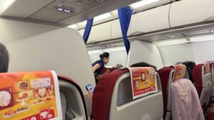 Shenzhen Airlines premium economy cabin divider on flight ZH9509