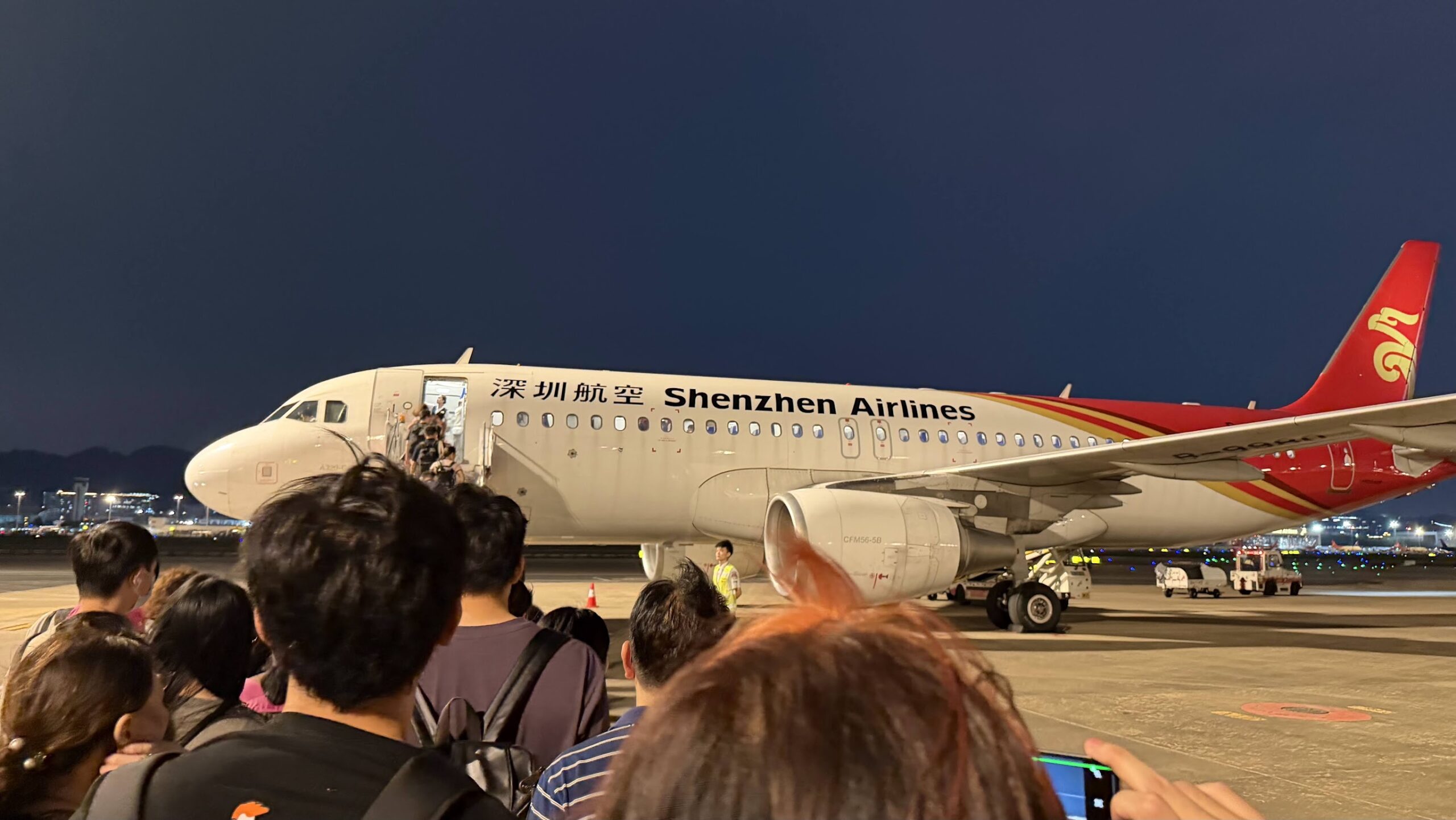 Boarding Shenzhen Airlines flight ZH9509 by stairs