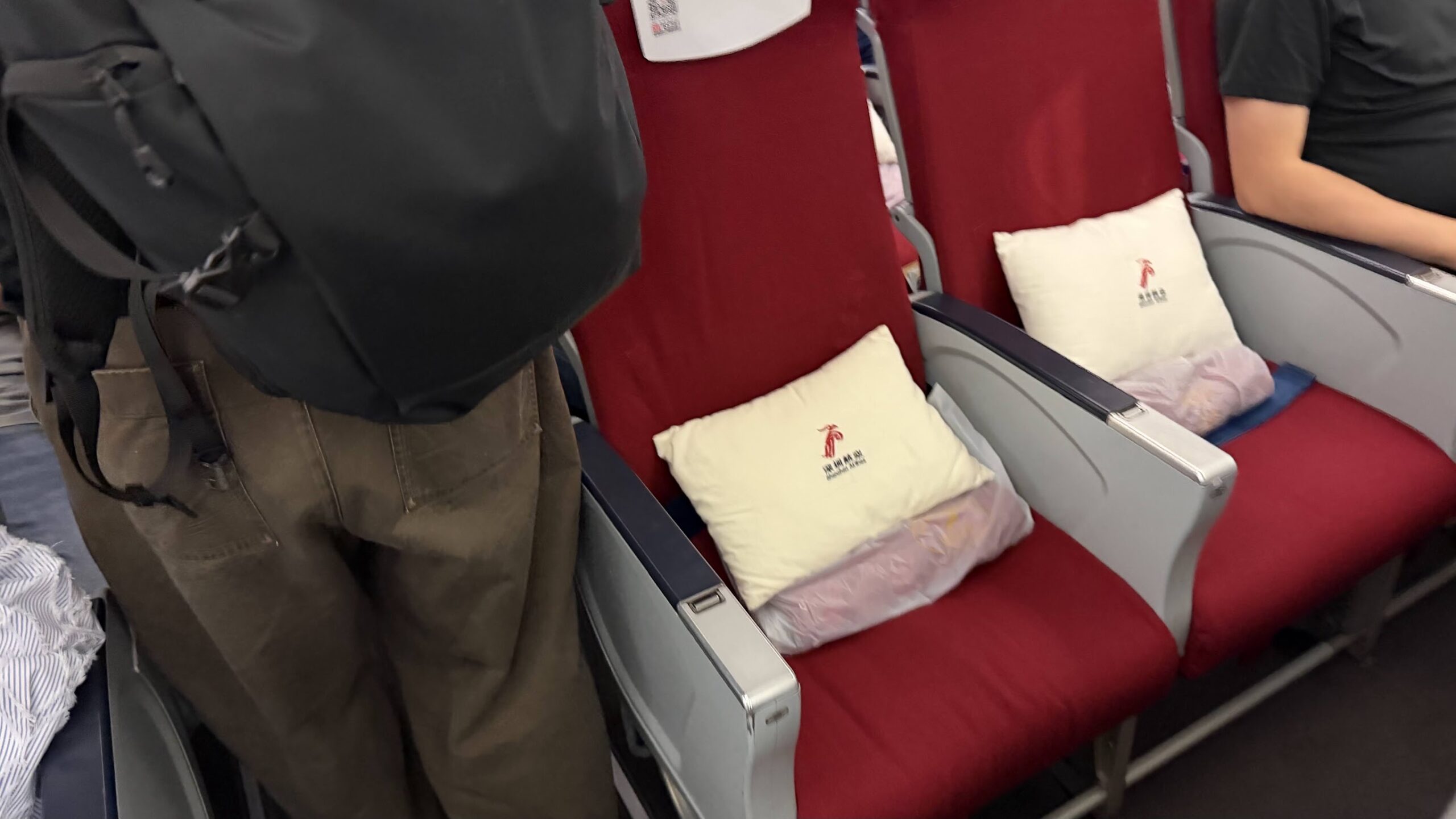 Shenzhen Airlines premium economy seats with pillows and blankets